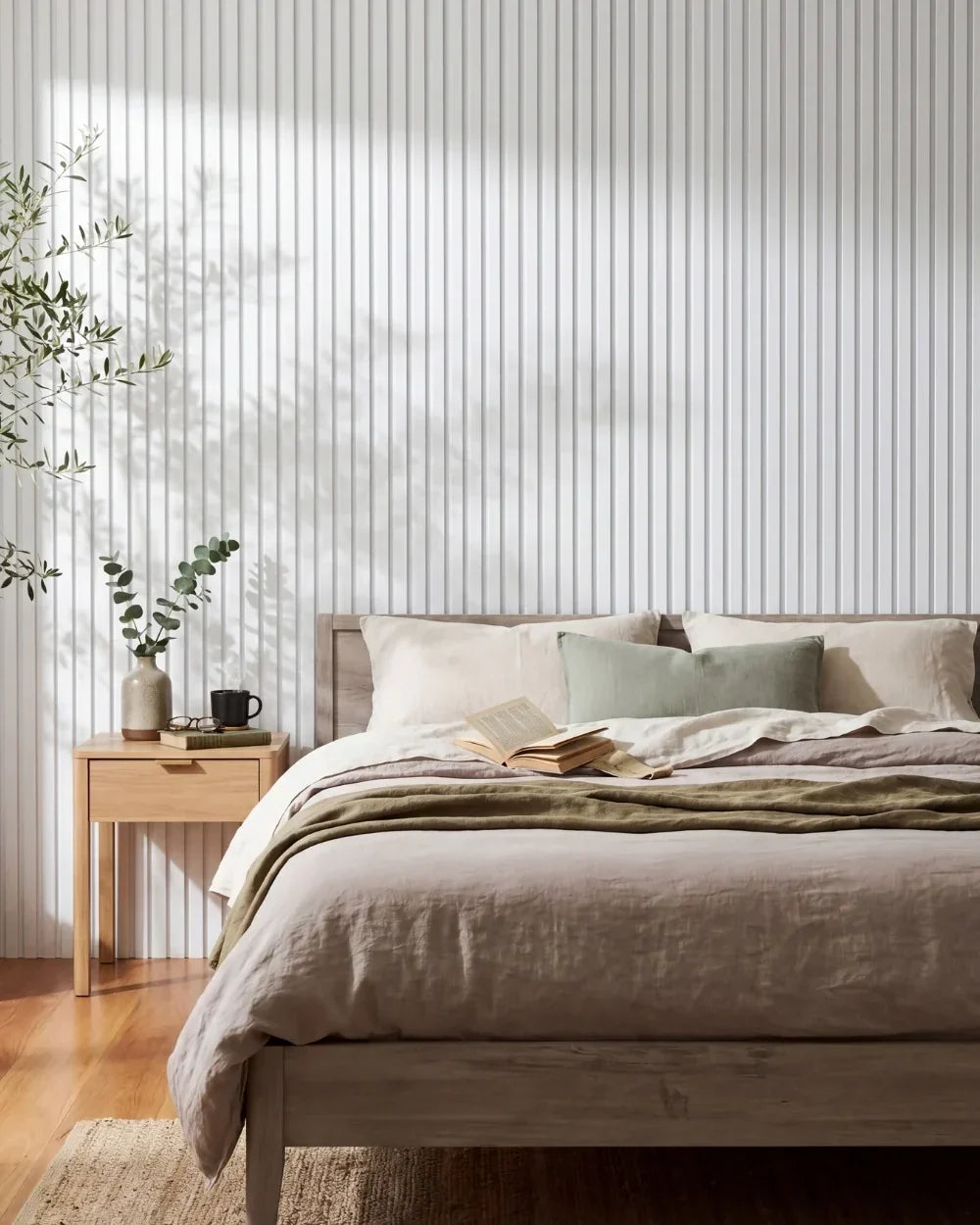 Acupanel White acoustic slat wall panels in a bedroom