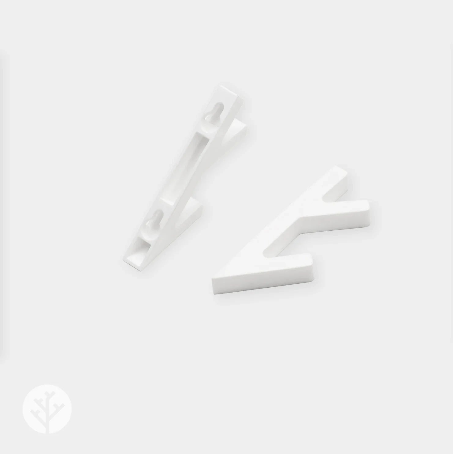 Two white 3D hooks from angled perspective showing the V-shaped hook profile shape