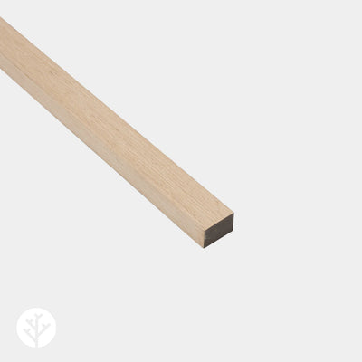 Acupanel oak wood end piece trim shown at angle on white background highlighting natural grain