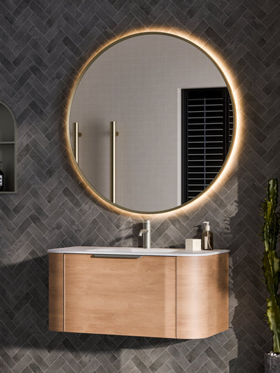 Aura round mirror mounted on Acupanel oak slat wall showing panel mount compatibility