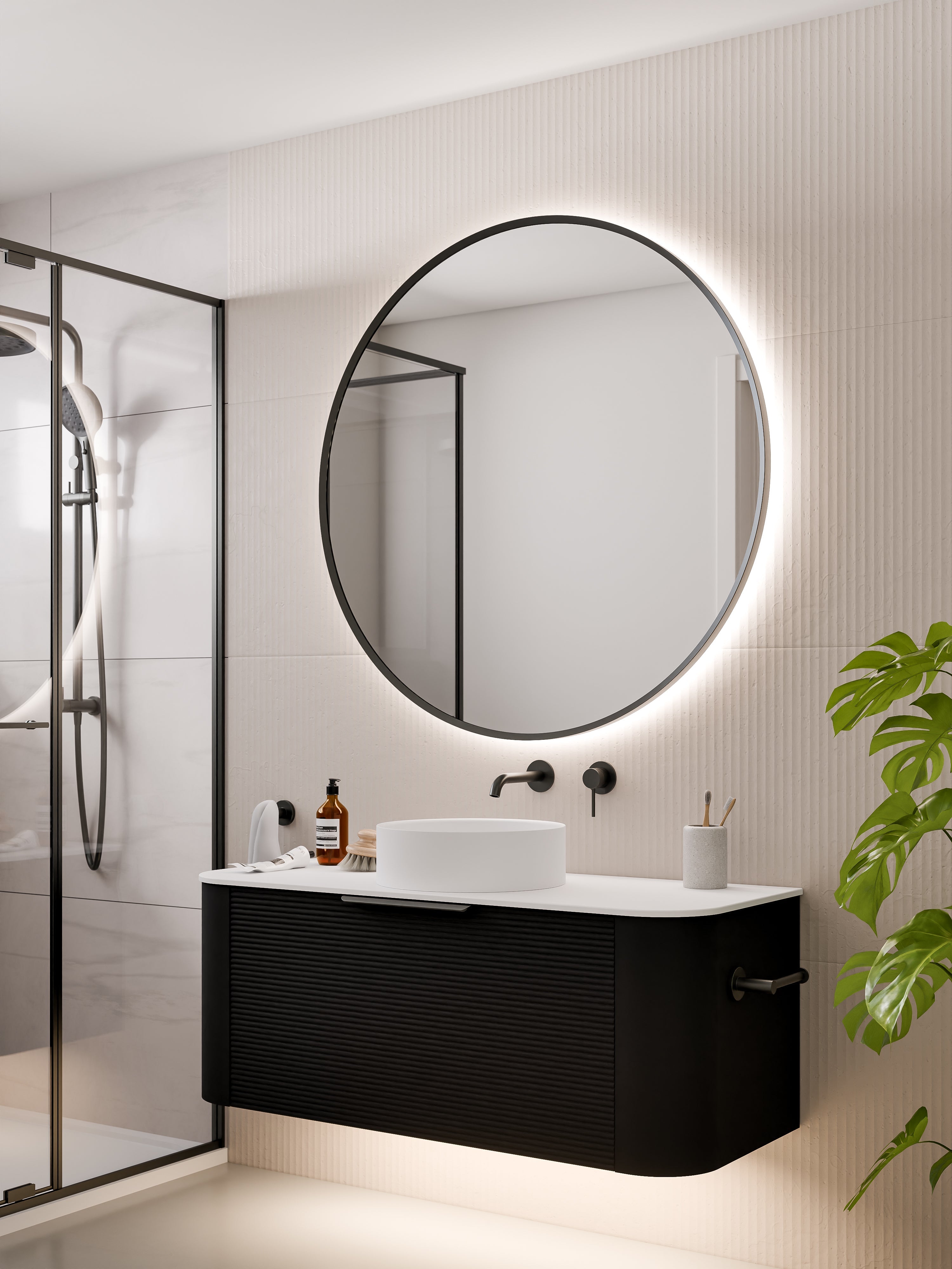 Aura round LED mirror in gold frame finish variant on white background