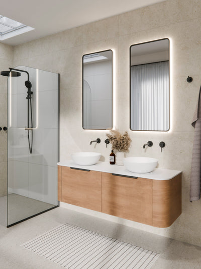 Side profile view of Aura LED mirror showing slim frame depth and wall mounting bracket