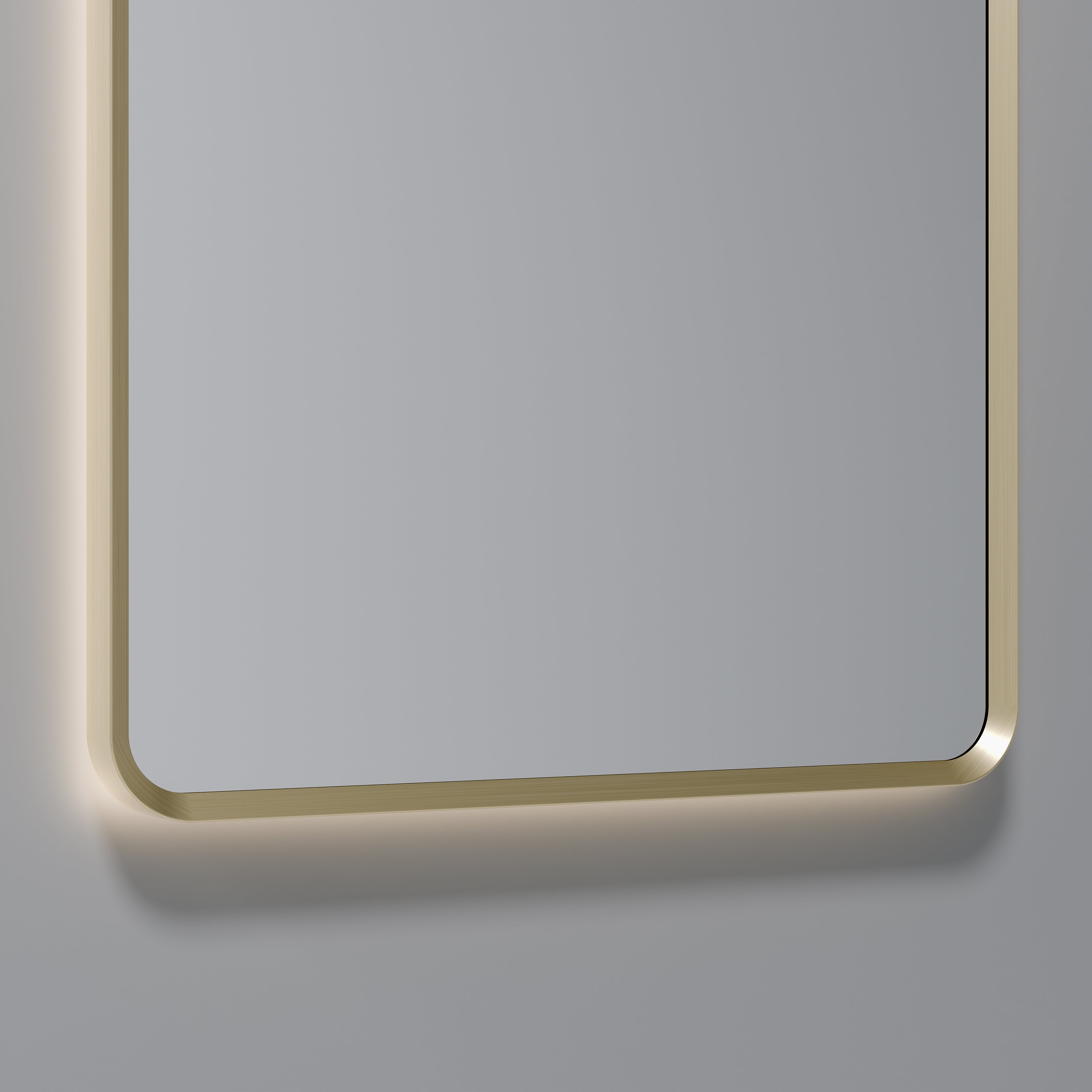 Close-up of touch sensor button on Aura mirror frame for controlling LED brightness