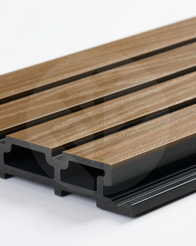 Close-up of Plaank oak composite slat texture showing realistic wood-effect grain finish
