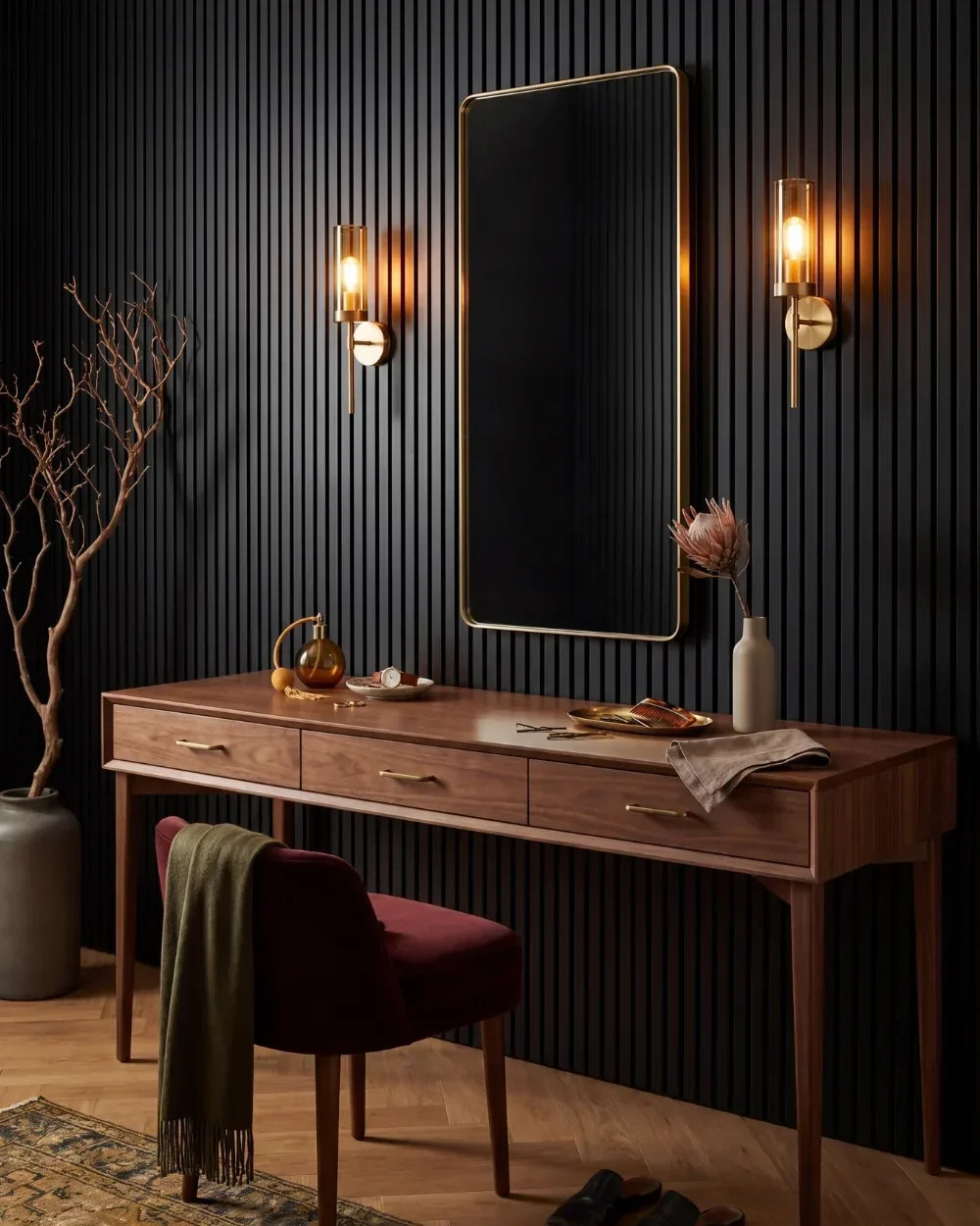 Acupanel Black acoustic slat wall panels behind a bedroom vanity