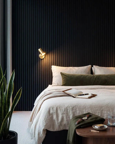 Acupanel Black acoustic slat wall panels in a bedroom