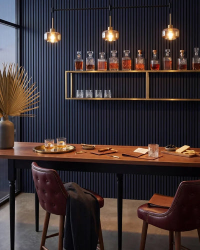 Acupanel Midnight Blue acoustic slat wall panels in a whisky bar