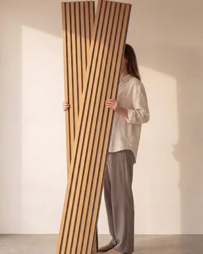 Acupanel Natural Oak (Grey Felt) acoustic slat wall panels held in studio