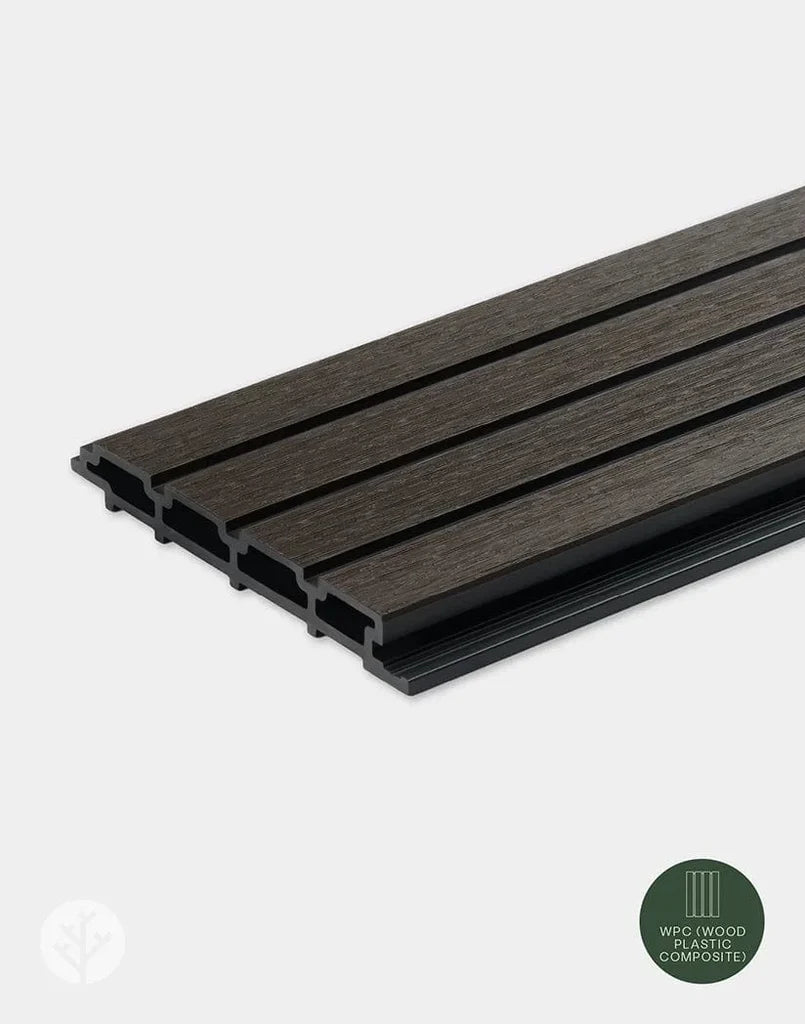 Close-up of Plaank walnut composite slat texture showing dark wood-effect grain finish