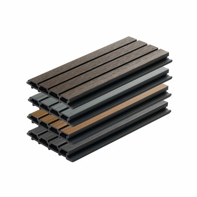 Plaank sample pieces in black grey oak and walnut laid out showing colour range comparison