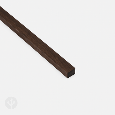 Acupanel smoked oak end piece trim showing dark wood finish and profile on white background