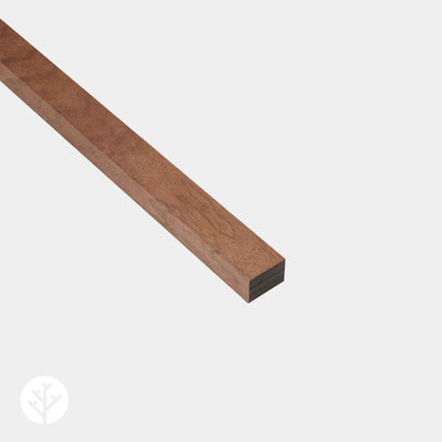 Acupanel walnut wood end piece trim showing rich dark grain and profile on white background