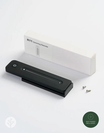 Close-up of Acupanel Glow remote buttons for dimming timer and on-off functions