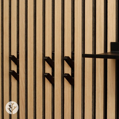 Close-up of empty black 3D hooks mounted between natural oak Acupanel slats showing profile