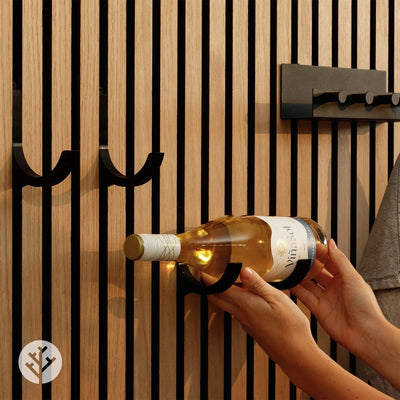 Close-up of empty black wine rack showing bracket design that fits between panel slats