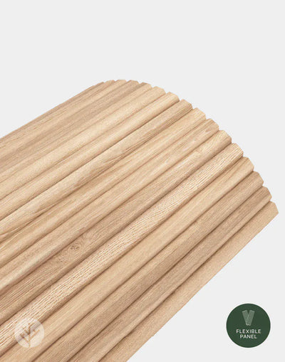 Close-up of Flutto oak slat panel showing fine parallel groove texture with Flexible Panel badge