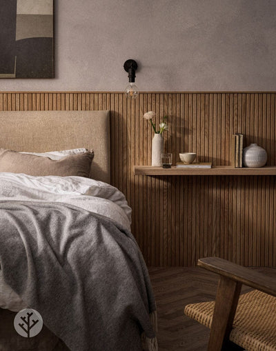 Bedroom with Flutto oak slat flexible panels as headboard feature wall with styled bedside table