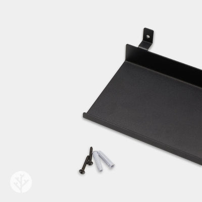 Side profile of small ledge shelf showing bracket that clips between Acupanel slats