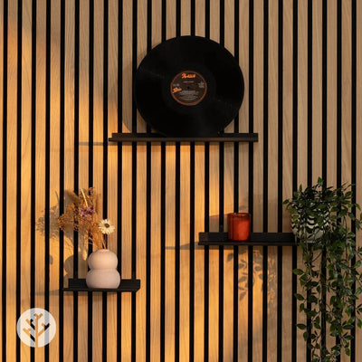 Close-up of large ledge shelf edge showing matte black powder-coated steel finish quality