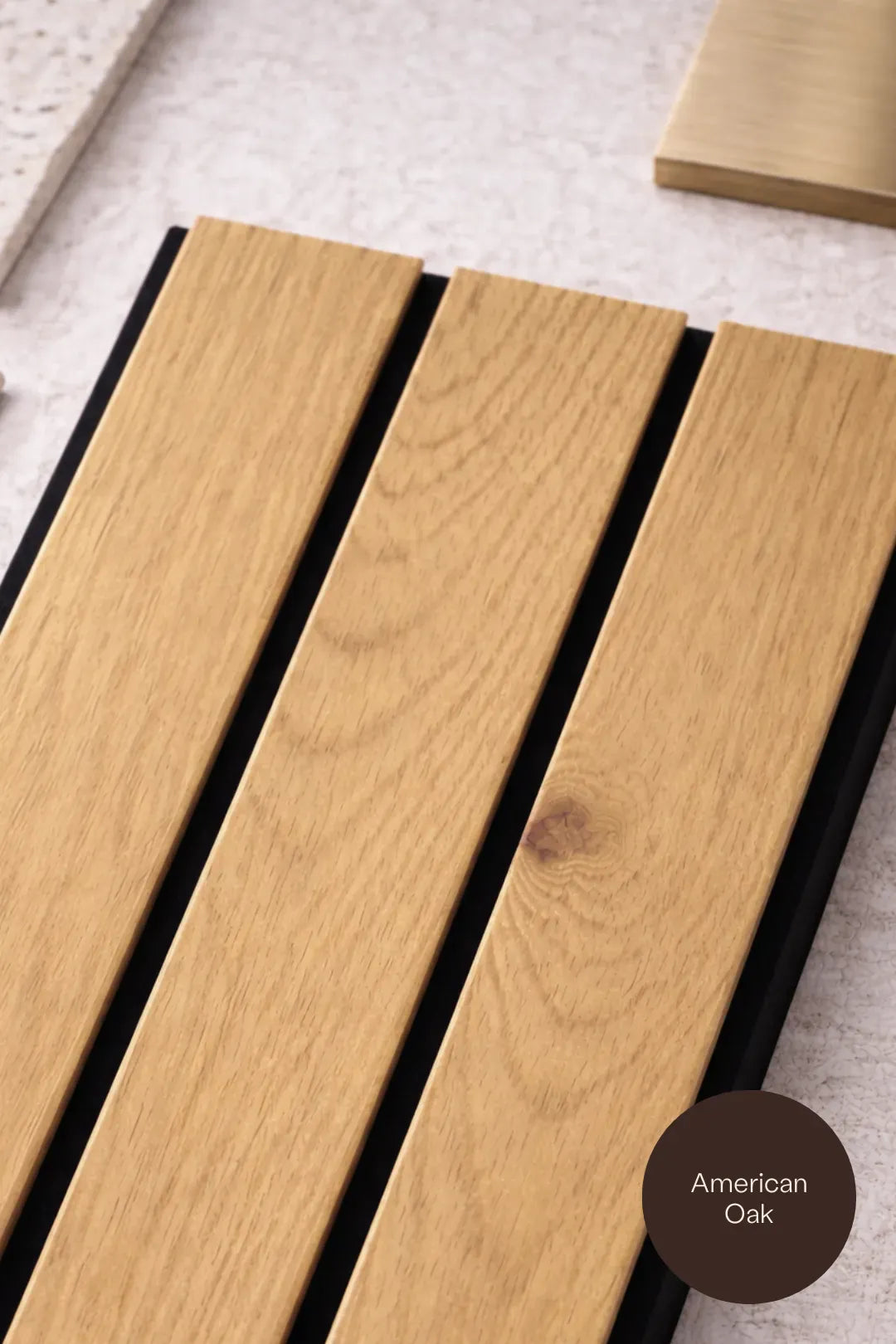 Close-up of wooden slats with 'American Oak' label on a light background