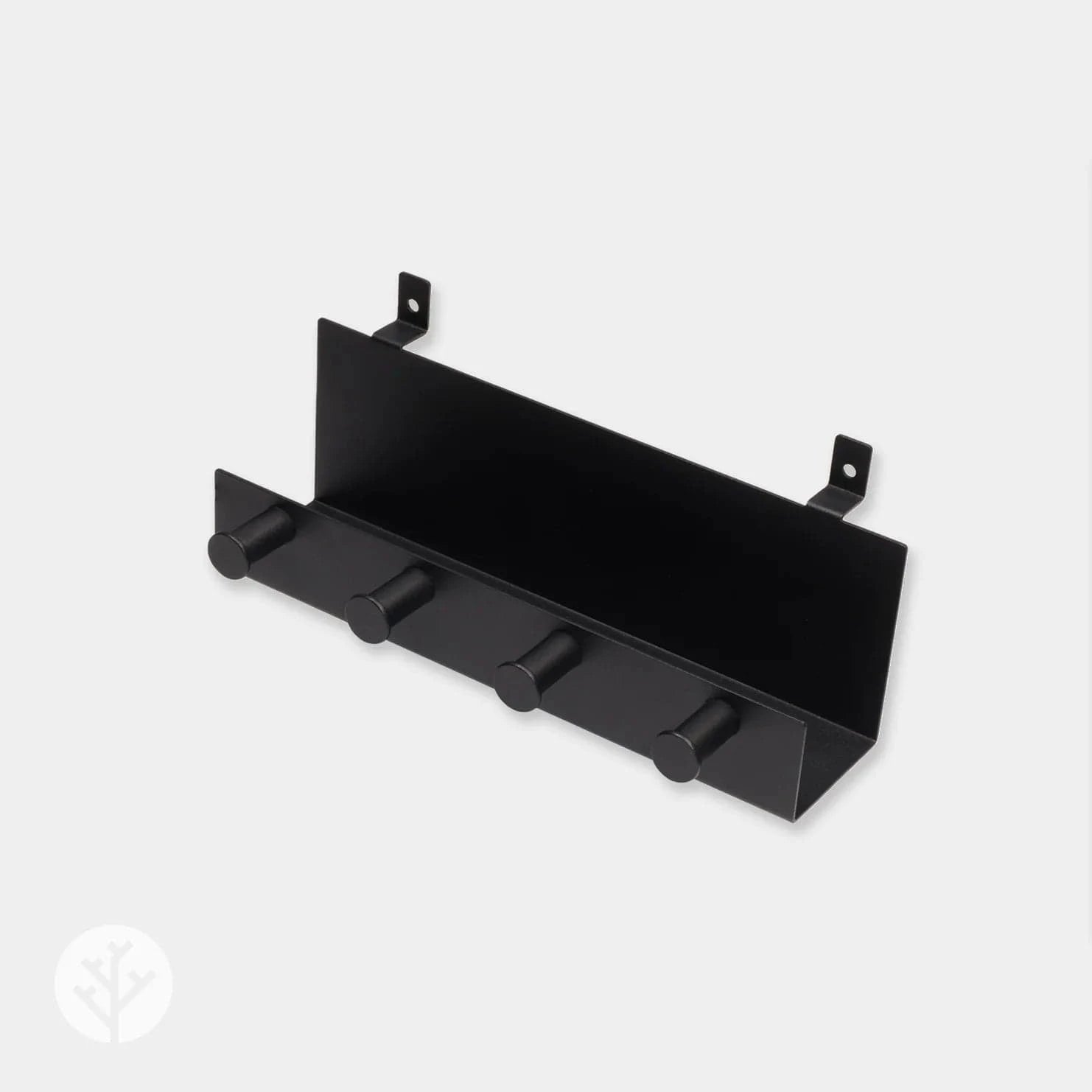 Hand placing item on shelf while towel hangs from peg below on Acupanel wall