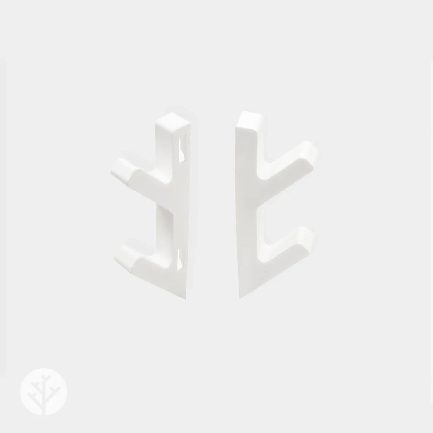 Front view of white 3D hooks showing tree-branch forked design with screw mounting holes