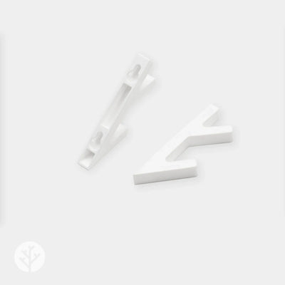 Two white 3D hooks from angled perspective showing the V-shaped hook profile shape