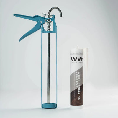 WVH wood panelling adhesive tube next to caulking gun showing compatible application setup